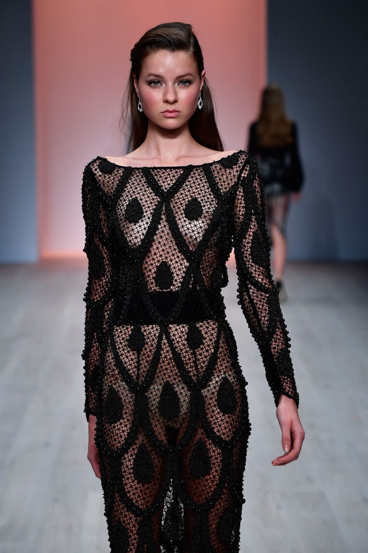 SYDNEY, AUSTRALIA - MAY 17: A model walks the runway during the Steven Khalil show at Mercedes-Benz Fashion Week Resort 17 Collections at Carriageworks on May 17, 2016 in Sydney, Australia. (Photo by Stefan Gosatti/Getty Images)