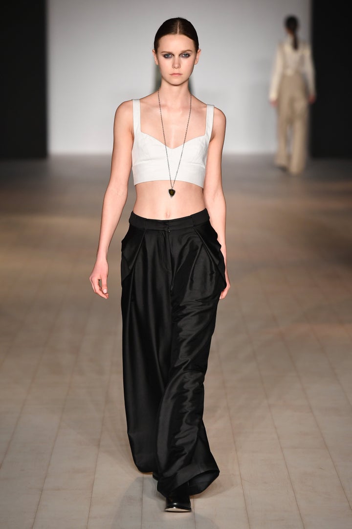 SYDNEY, AUSTRALIA - MAY 17: A model walks the runway during the Bianca Spender show at Mercedes-Benz Fashion Week Resort 17 Collections at Carriageworks on May 17, 2016 in Sydney, Australia. (Photo by Stefan Gosatti/Getty Images)