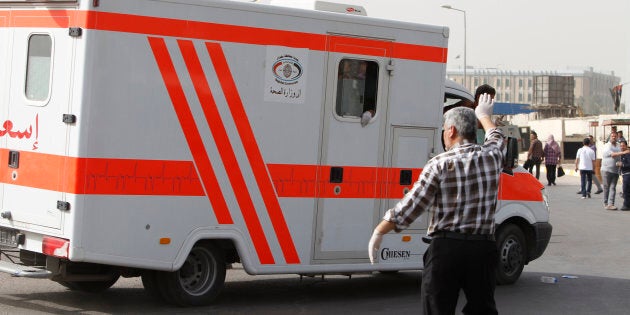 Iraqi security forces gather at the site of a suicide bombing in the Shaab area in northern Baghdad on May 17, 2016.Interior ministry spokesman Saad Maan said the attack was carried out by a female suicide bomber, while a police colonel said a roadside bombing was followed by the suicide attack. / AFP / AHMAD AL-RUBAYE (Photo credit should read AHMAD AL-RUBAYE/AFP/Getty Images)