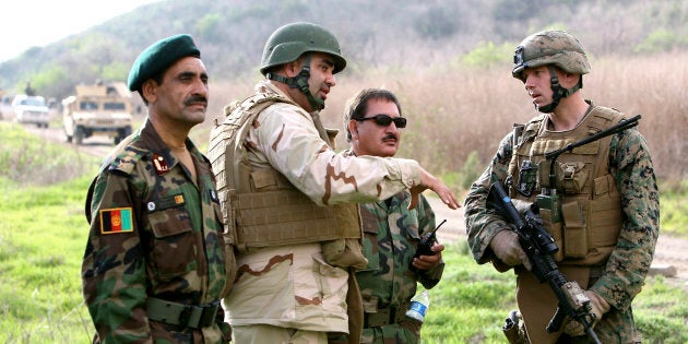 Afghan national army officers discuss lessons learned alongside Marines and Navy personnel while participating in combat scenario training exercises at U.S. Marine Corps Base Camp Pendleton in California. Dozens of Afghan troops have now gone missing.