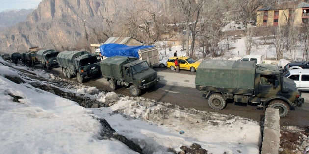 A Turkish military convoy arrives in the south-eastern Turkish border town of Cukurca, bordering Iraq, February 29, 2008. Turkey's military General Staff said on Friday that its troops had returned to bases in Turkey after a major ground offensive against Kurdish PKK rebels in northern Iraq. REUTERS/Fatih Saribas (TURKEY)