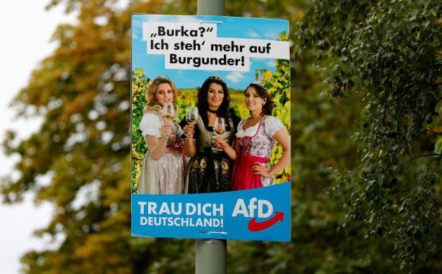 An election campaign poster for the anti-immigration party Alternative for Germany (AfD) in Berlin. The words read, "Burqa? I like Burgundy wine, more."