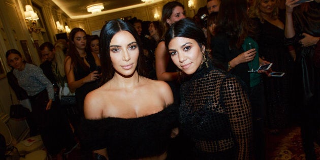 Kim and Kourtney Kardashian in Paris just a couple days before the robbery.