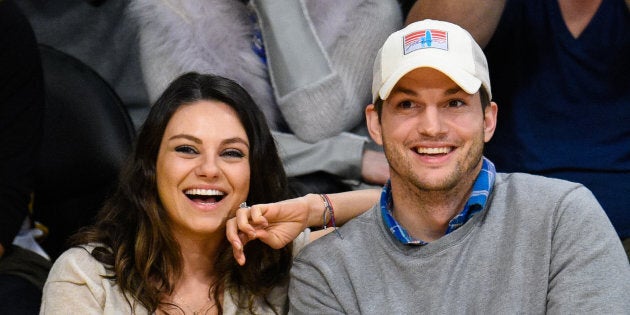 LOS ANGELES, CA - DECEMBER 19: Mila Kunis (L) and Ashton Kutcher attend a basketball game between the Oklahoma City Thunder and the Los Angeles Lakers at Staples Center on December 19, 2014 in Los Angeles, California. (Photo by Noel Vasquez/GC Images)