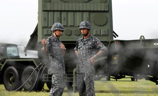 Japan Self-Defense Forces soldiers take part in a drill to mobilise their Patriot Advanced Capability-3 missile unit in response to a recent missile launch by North Korea, at U.S. Air Force Yokota Air Base in Fussa on the outskirts of Tokyo on August 29.