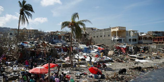 People gather at the shore after Hurricane Matthew passes in Jeremie, Haiti, October 8, 2016