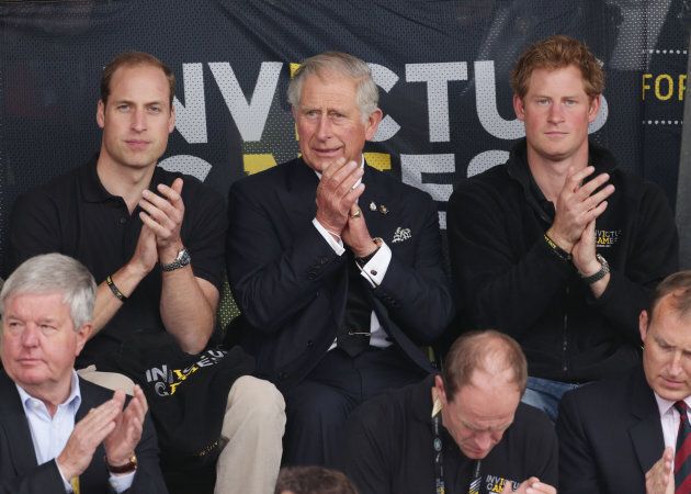 The Duke of Cambridge, Prince Charles and Prince Harry during day two of the Invictus Games Athletics competition, at Lee Valley Athletics Centre, London
