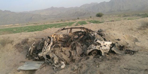 QUETTA, PAKISTAN - MAY 22 : Wreckage of a destroyed vehicle in which Mullah Mohammad Akhtar Mansour was allegedly traveling in Noshki, Balochistan province is seen after it was hit by US drone on May 22, 2016. According to reports a US drone attacked a vehicle said to be carrying Mullah Mansoor and his driver in Noshki, Balochistan province, Pakistan. (Photo by Barkat Tareen /Anadolu Agency/Getty Images)