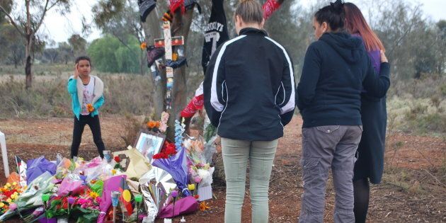 Mourners pay their respects at a tribute to dead teen Elijah Doughty in August