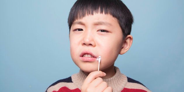 DO NOT TOUCH YOUR COLD SORE. Use a cotton tip instead, like this smart little guy.