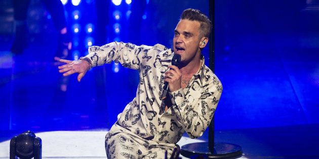 LONDON, ENGLAND - SEPTEMBER 25: AVAILABLE FOR LICENSE FOR 30 DAYS FROM CREATE DATE. Robbie Williams performs on stage at the Apple Music Festival at The Roundhouse on September 25, 2016 in London, England. (Photo by Dave J Hogan/Dave J Hogan/Getty Images)