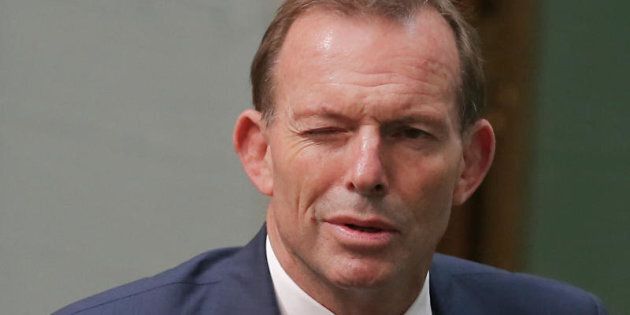 Tony Abbott winks as he departs Question Time