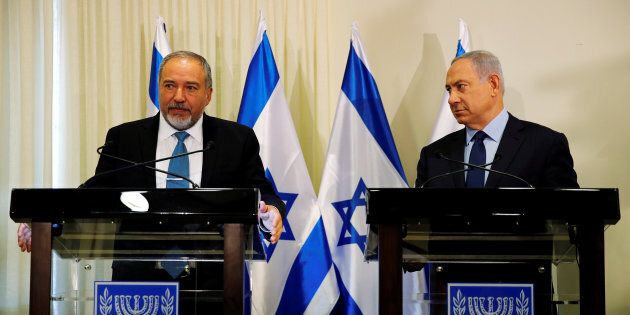 Benjamin Netanyahu, right, and Avigdor Lieberman issued assurances that the new right-wing government would behave responsibly and continue to seek peace with Israel's neighbors.