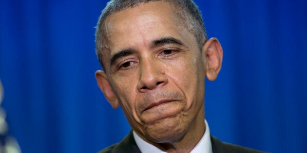 President Barack Obama pauses as he speaks during a news conference at the Shima Kanko Hotel in Shima, Japan, Thursday, May 26, 2016, after the end of the third working session of the G-7 Summit. (AP Photo/Carolyn Kaster)