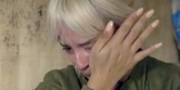 Lily Allen wipes at tears during her visit to the Calais 'Jungle' 