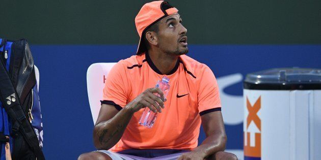 Nick Kyrgios has exited the Shanghai Masters after putting in a very ordinary effort.
