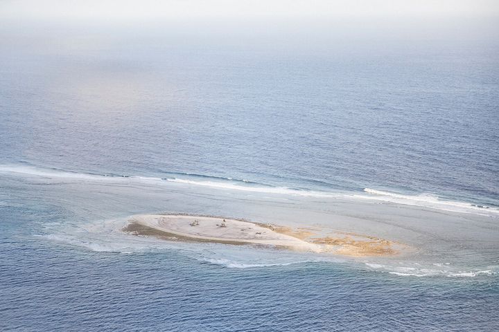 A small islet in the Unity Atoll of the Federated States of Micronesia. With only a few palm trees remaining, the islet is almost submerge underwater during high tides.