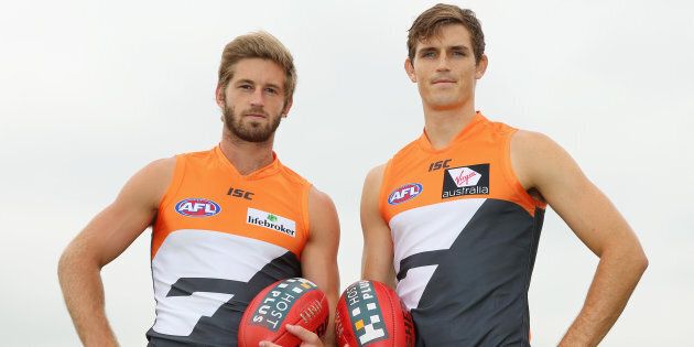 Callan Ward (left) and Phil Davis after being named co-captains in 2014.
