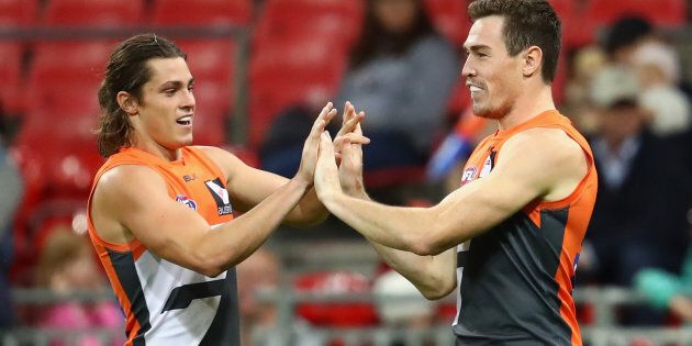It's high fives all-round at the Giants these days. Very high if you're Jeremy Cameron (right)