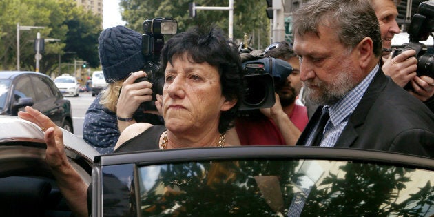 Late cricketer Phil Hughes parents Greg and Virginia Hughes leave Downing Centre after the final day of the inquest into Phil Hughes death on October 14, 2016 in Sydney