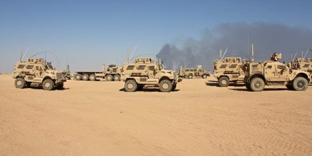 Mine-resistant vehicles based at Qayyarah Airfield West, which will be a key staging area for U.S. and allied troops during the battle for Mosul. ISIS often uses roadside bombs and suicide bombers to target combatants and civilians.