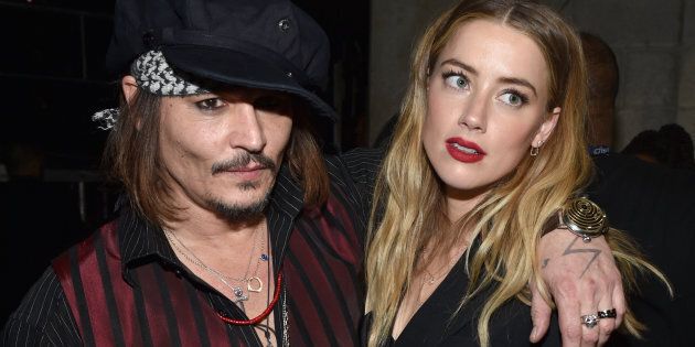 Johnny Depp and Amber Heard attend the 2015 Grammy Awards together. 