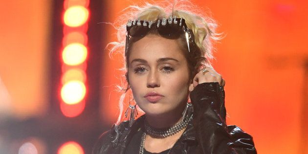 LAS VEGAS, NV - SEPTEMBER 23: Entertainer Miley Cyrus performs during her appearance with Billy Idol at the 2016 iHeartRadio Music Festival at T-Mobile Arena on September 23, 2016 in Las Vegas, Nevada. (Photo by Ethan Miller/WireImage)