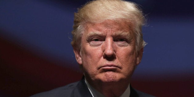 VIRGINIA BEACH, VA - SEPTEMBER 06: Republican presidential nominee Donald Trump pauses during a campaign event September 6, 2016 in Virginia Beach, Virginia. Trump participated in a discussion with retired Army Lieutenant General Michael Flynn. (Photo by Alex Wong/Getty Images)