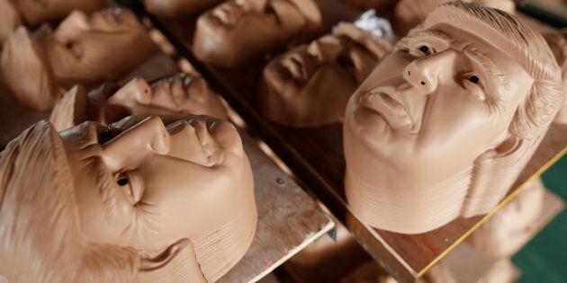 The Jinhua Partytime Latex Art and Crafts Factory is churning out masks of presidential candidates Hillary Clinton and Donald Trump.