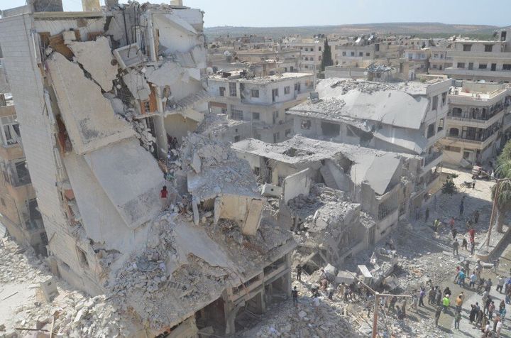 A ruined Syrian city, in the aftermath of an attack by government helicopters (Getty Images)