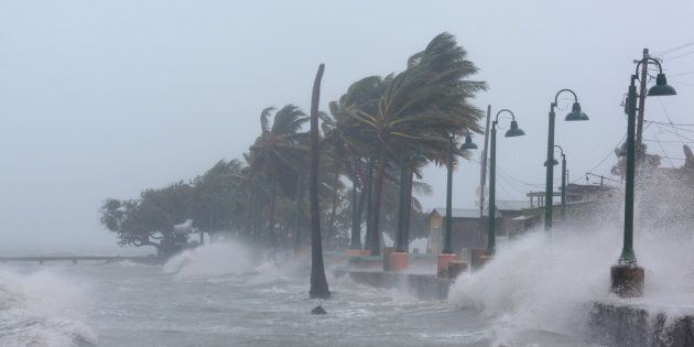 Waves crash against the seawall as Hurricane Irma slammed across islands in the northern Caribbean on Wednesday, in Fajardo, Puerto Rico September 6, 2017.