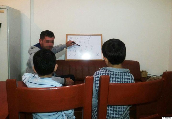 Rabis teaches his boys English at home