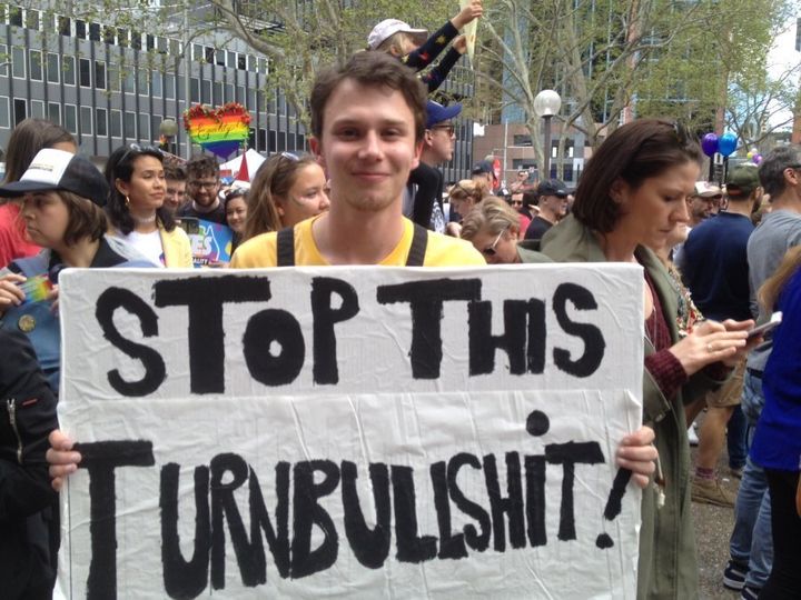 Sydneysider Liam McMahon shows his support for marriage equality credit.