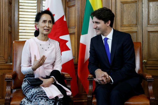 Canada's Prime Minister Justin Trudeau (R) listens to Myanmar State Counsellor Aung San Suu Kyi speak during a meeting in Trudeau's office on Parliament Hill in Ottawa, Ontario, Canada, June 7, 2017.