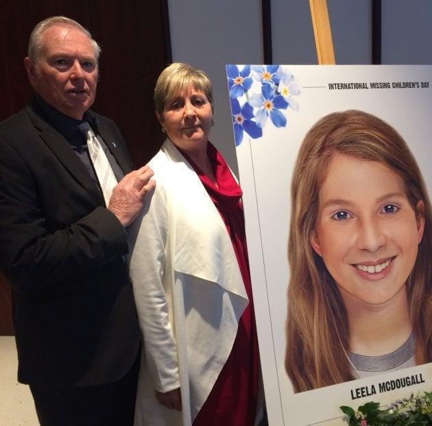 Jim and Cath McDougall with an age-progressed photo of their granddaughter Leela, who would be 16 years old if found alive. A coroner's inquest into her disappearance will be held in December.