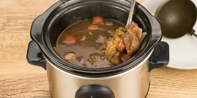 A slow cook crock pot beef dinner on a kitchen worktop