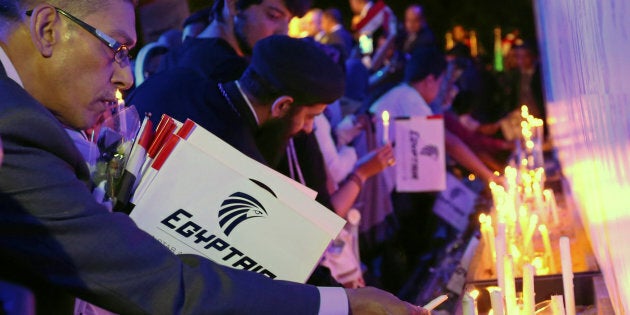 People light candles during a candlelight vigil for the victims of EgyptAir flight 804, at the Cairo Opera House in Cairo, Egypt May 26, 2016. REUTERS/Mohamed Abd El Ghany