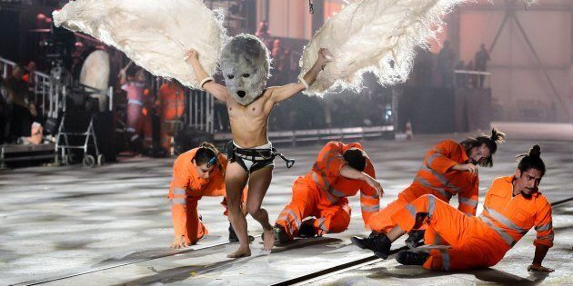Artists perform during a show on the opening day of the Gotthard rail tunnel at the fairground Rynaecht at the northern portal in Erstfeld, Switzerland, on June 1, 2016.The new Gotthard Base Tunnel (GBT) is set to become the world's longest railway tunnel when it opens on June 1.The 57-kilometre (35.4-mile) tunnel, which runs under the Alps, was first conceived in sketch-form in 1947 but construction began 17 years ago. / AFP / FABRICE COFFRINI (Photo credit should read FABRICE COFFRINI/AFP/Getty Images)