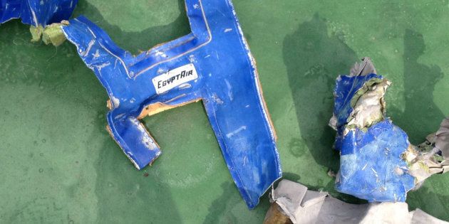 FILE PHOTO: Recovered debris of the EgyptAir jet that crashed in the Mediterranean Sea is seen in this handout image released May 21, 2016 by Egypt's military. Egyptian Military/Handout via Reuters/File photo ATTENTION EDITORS - THIS IMAGE WAS PROVIDED BY A THIRD PARTY. EDITORIAL USE ONLY. NO RESALES. NO ARCHIVE. THIS PICTURE WAS PROCESSED BY REUTERS TO ENHANCE QUALITY. AN UNPROCESSED VERSION HAS BEEN PROVIDED SEPARATELY. TPX IMAGES OF THE DAY
