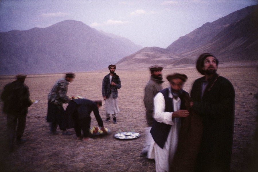 Massoud with close friends after an early evening prayer service, Feyzabad, 1998.