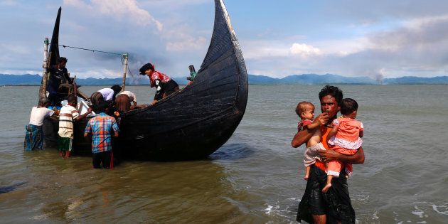Rohingya Muslims are paying Bangladeshi fisherman to ferry them to safety.