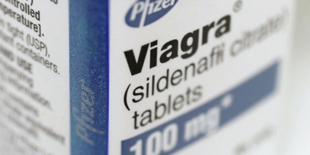 Pfizer Inc.'s Viagra medication sits on a pharmacy shelf in Provo, Utah, U.S., on Wednesday, Aug. 31, 2016. A Nov. 2015 forecast from health data firm IMS Health expects global sales of brand and generic prescription drugs, and nonprescription medicines, to total $1.4 trillion in 2020. Photographer: George Frey/Bloomberg via Getty Images