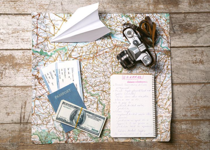 A map and plane tickets would be a pretty fun way to celebrate one year together.
