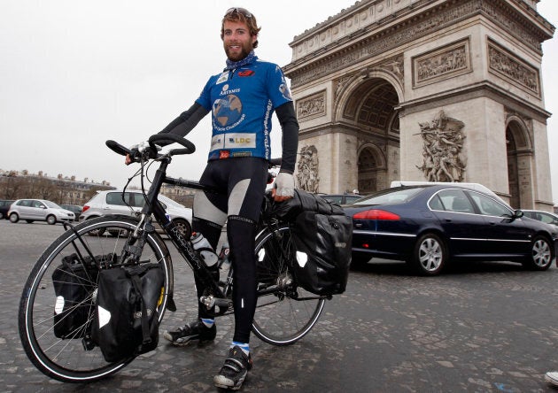 Beaumont pictured next to the Arc de Triomphe after completing his tour.