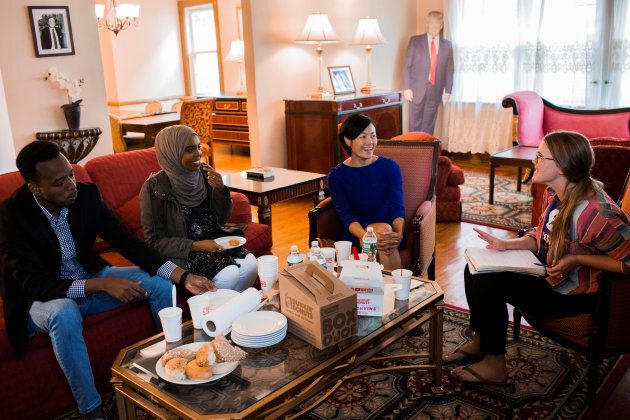 Refugees share their stories inside Donald Trump's childhood home.