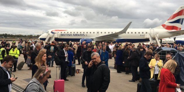 Photos posted to social media appear to show passengers waiting on the tarmac