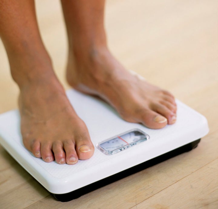 Obsessively weighting yourself is another warning sign.