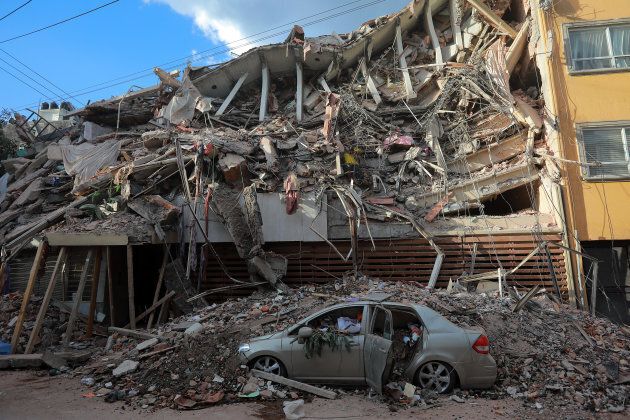 Wreckage of a building knocked down by a magnitude 7.1 earthquake that jolted central Mexico damaging buildings, knocking out power and causing alarm throughout the capital.