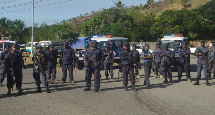 Heavily-armed Papua New Guinea police form a roadblock, preventing students from leaving the University of Papua New Guinea in Port Moresby, Papua New Guinea, June 8, 2016.