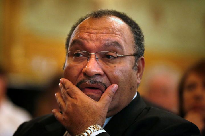 Papua New Guinea Prime Minister Peter O'Neill, pictured here in Sydney in 2012, says a small group of students were violent.